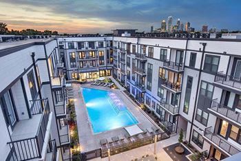 Resort-inspired pool with in-water tanning ledge